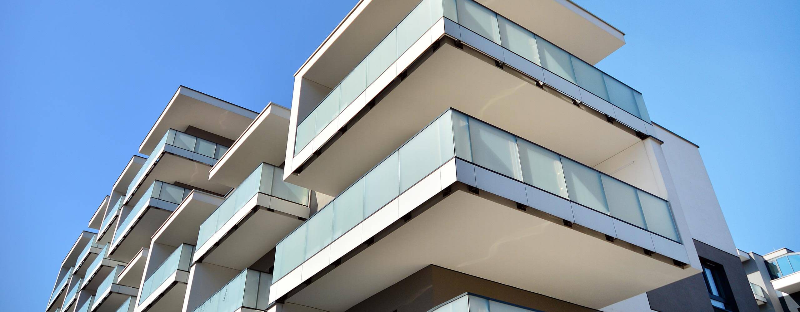 Modern apartment building with many balconies